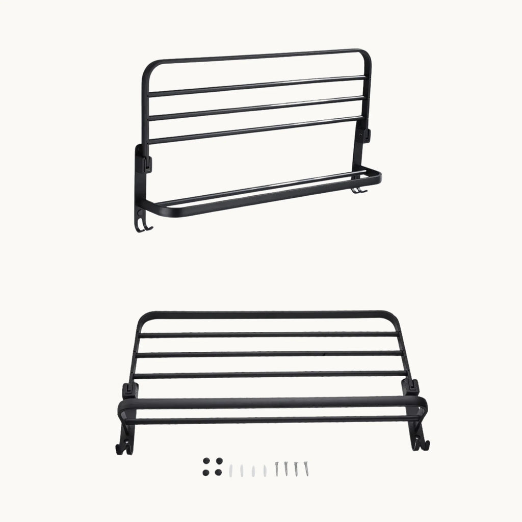Black wall mounted drying rack with installation hardware, space-saving bathroom accessory.
