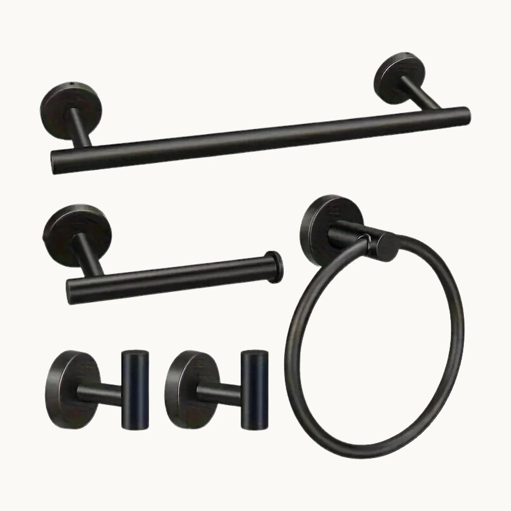 Modern black bathroom hardware set with towel bar, ring, hooks, and toilet paper holder