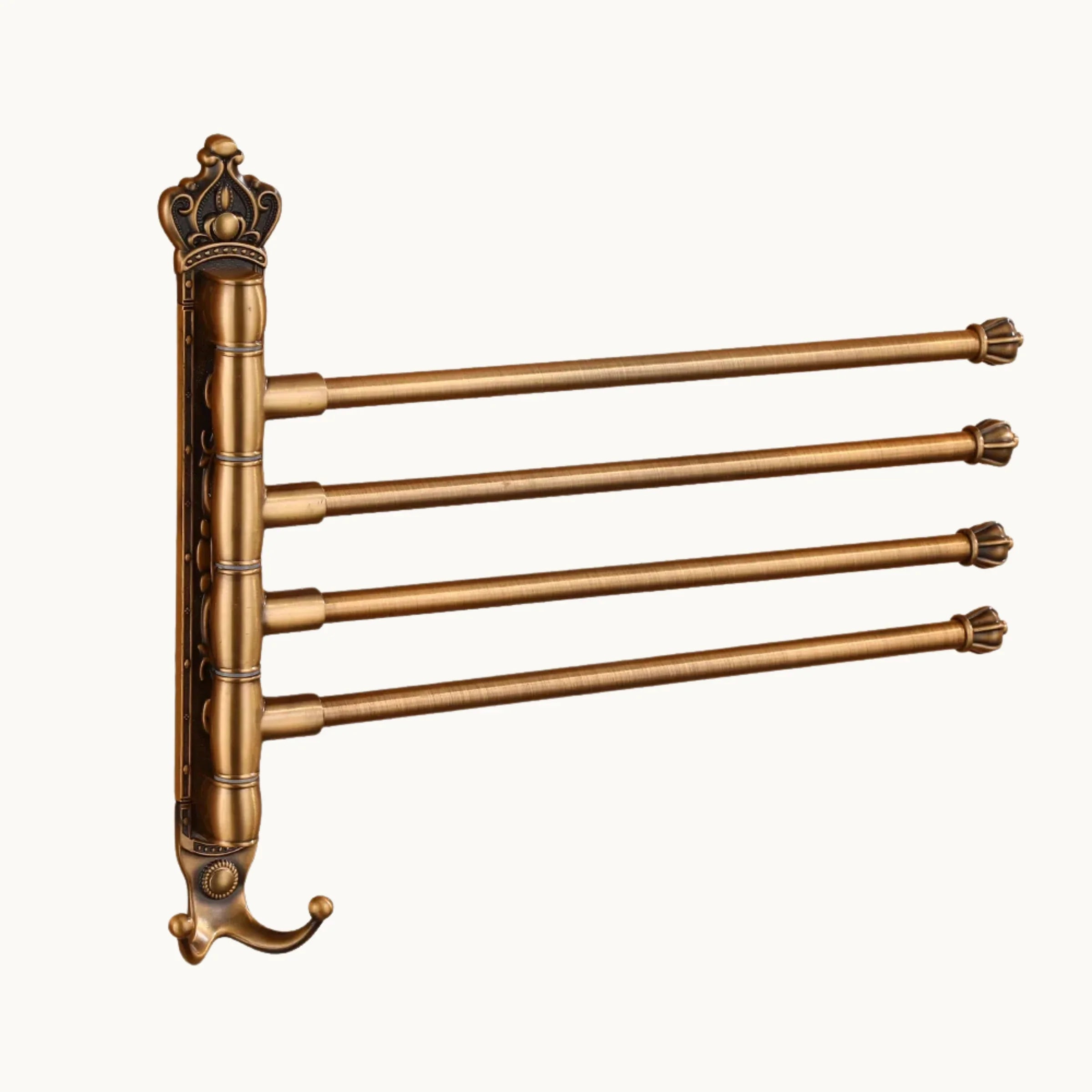 Vintage brass wall mounted drying rack with four swing arms and decorative crown detail