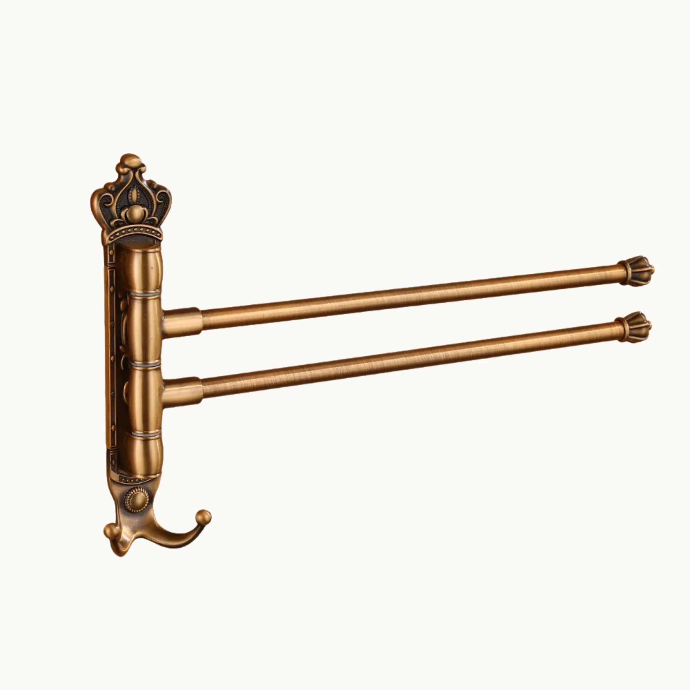 Vintage brass wall mounted towel rack with two swivel bars and decorative crown design