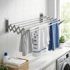 Wall mounted drying rack in laundry room with clothes and towels hanging