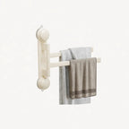 Wall-mounted swivel drying rack with two towels, space-saving bathroom organizer