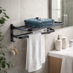Wall mounted bathroom towel rack with folded towels and hanging brush above modern sink