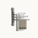 Wall mounted stainless steel swivel towel rack with three arms holding towels