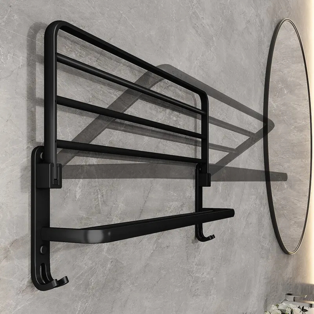 Modern black wall mounted drying rack with hooks in a bathroom setting
