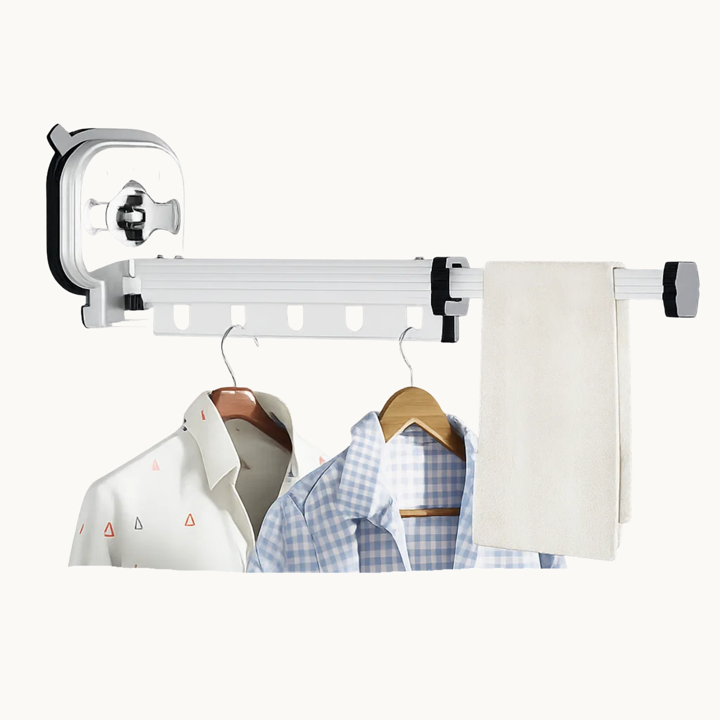 Wall mounted drying rack with shirts and a towel hanging, space-saving home organizer